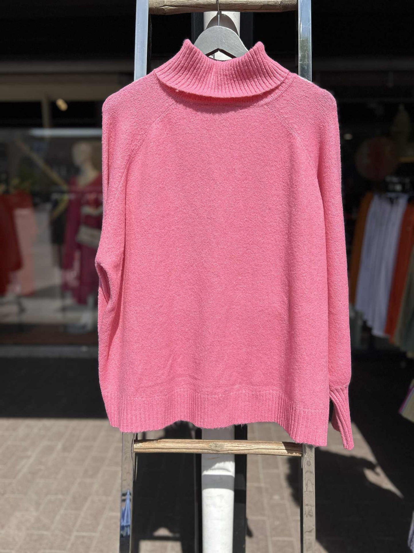 Pink strikkegenser